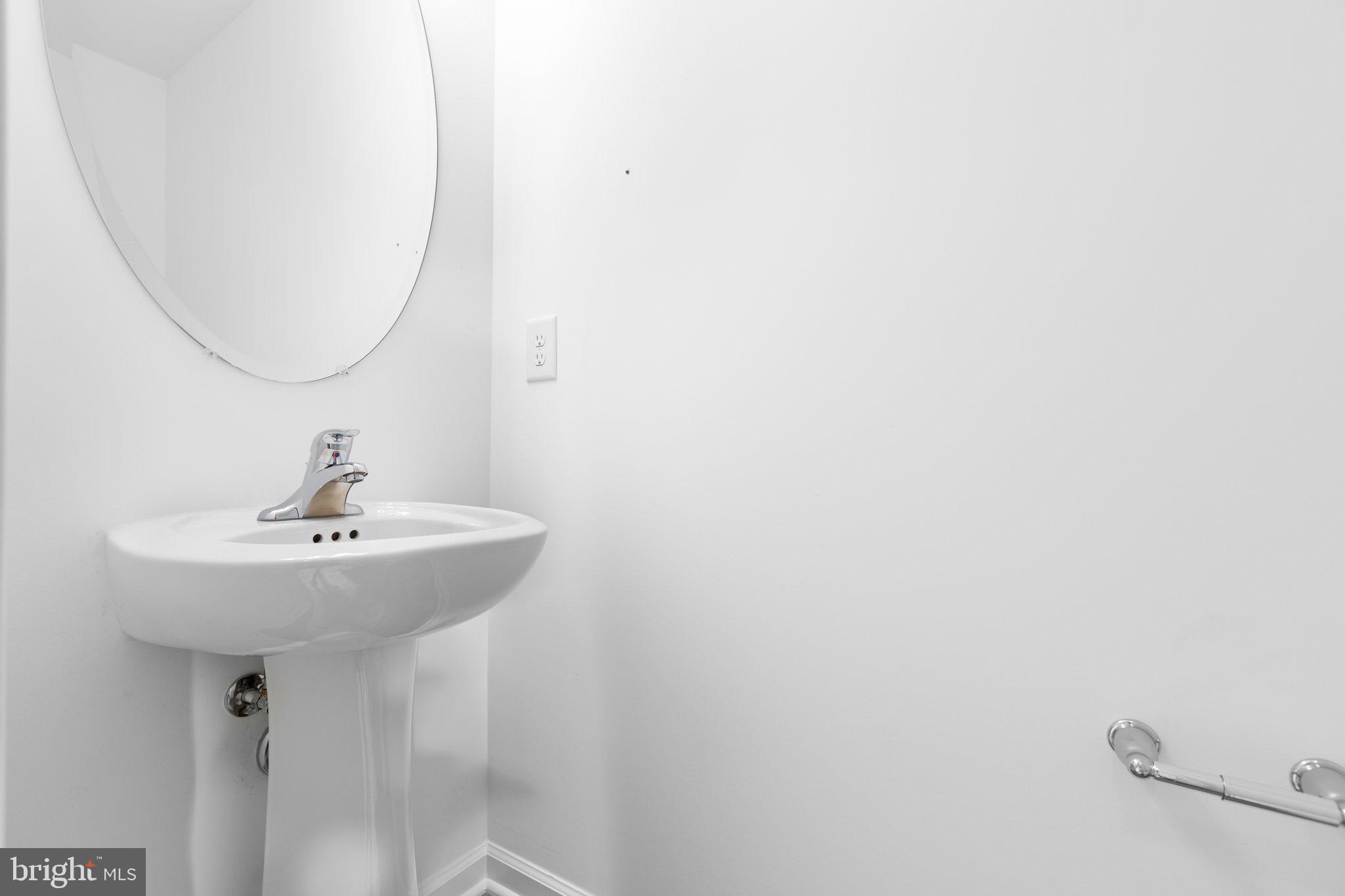 282 Circle Lane Colonial Beach, VA 22443 - Photo 50 of 57 a bathroom with a sink and a mirror