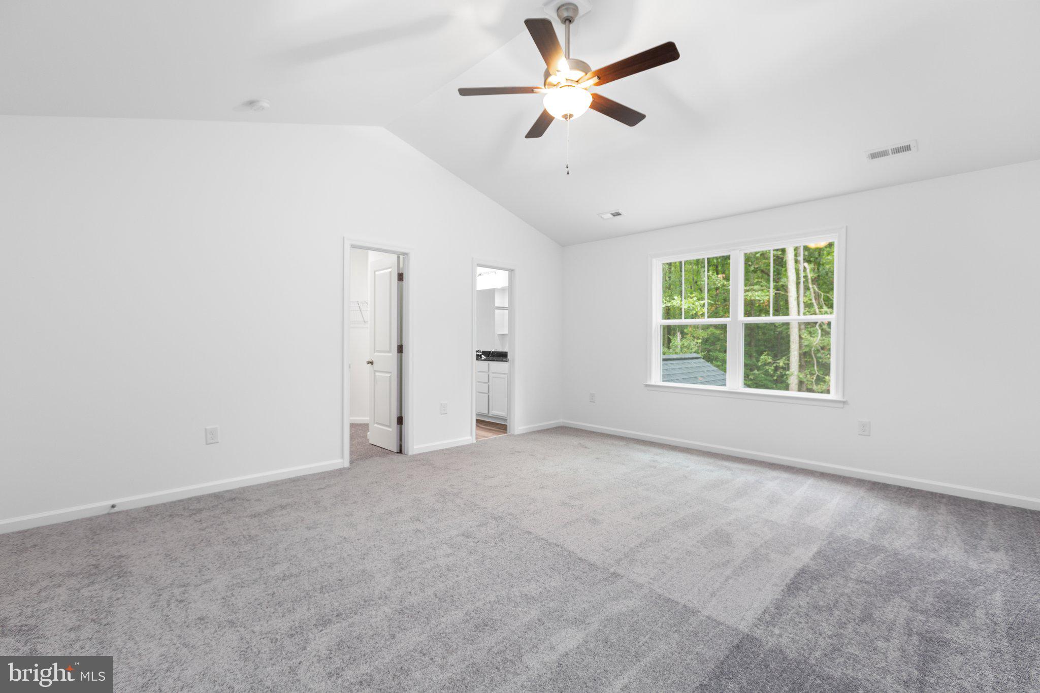 282 Circle Lane Colonial Beach, VA 22443 - Photo 51 of 57 an empty room with a window and a fan