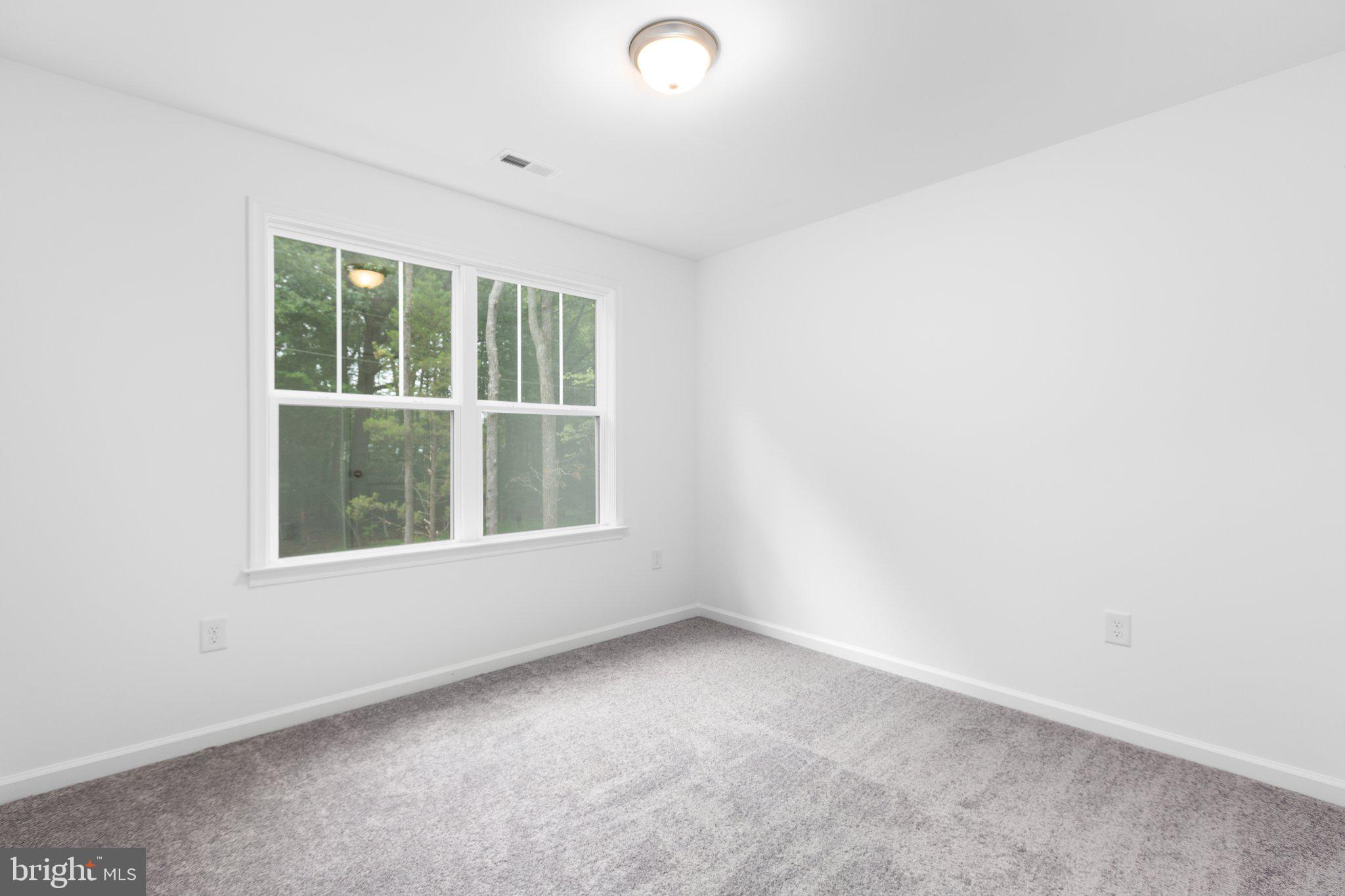 282 Circle Lane Colonial Beach, VA 22443 - Photo 55 of 57 an empty room with a window