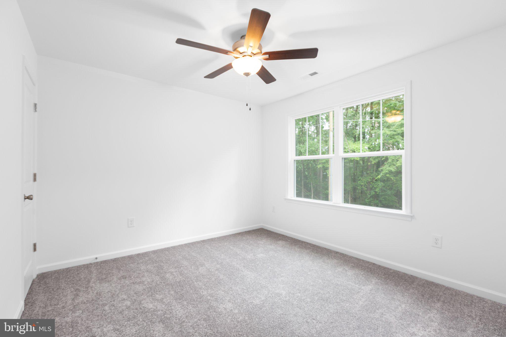 282 Circle Lane Colonial Beach, VA 22443 - Photo 56 of 57 an empty room with a window