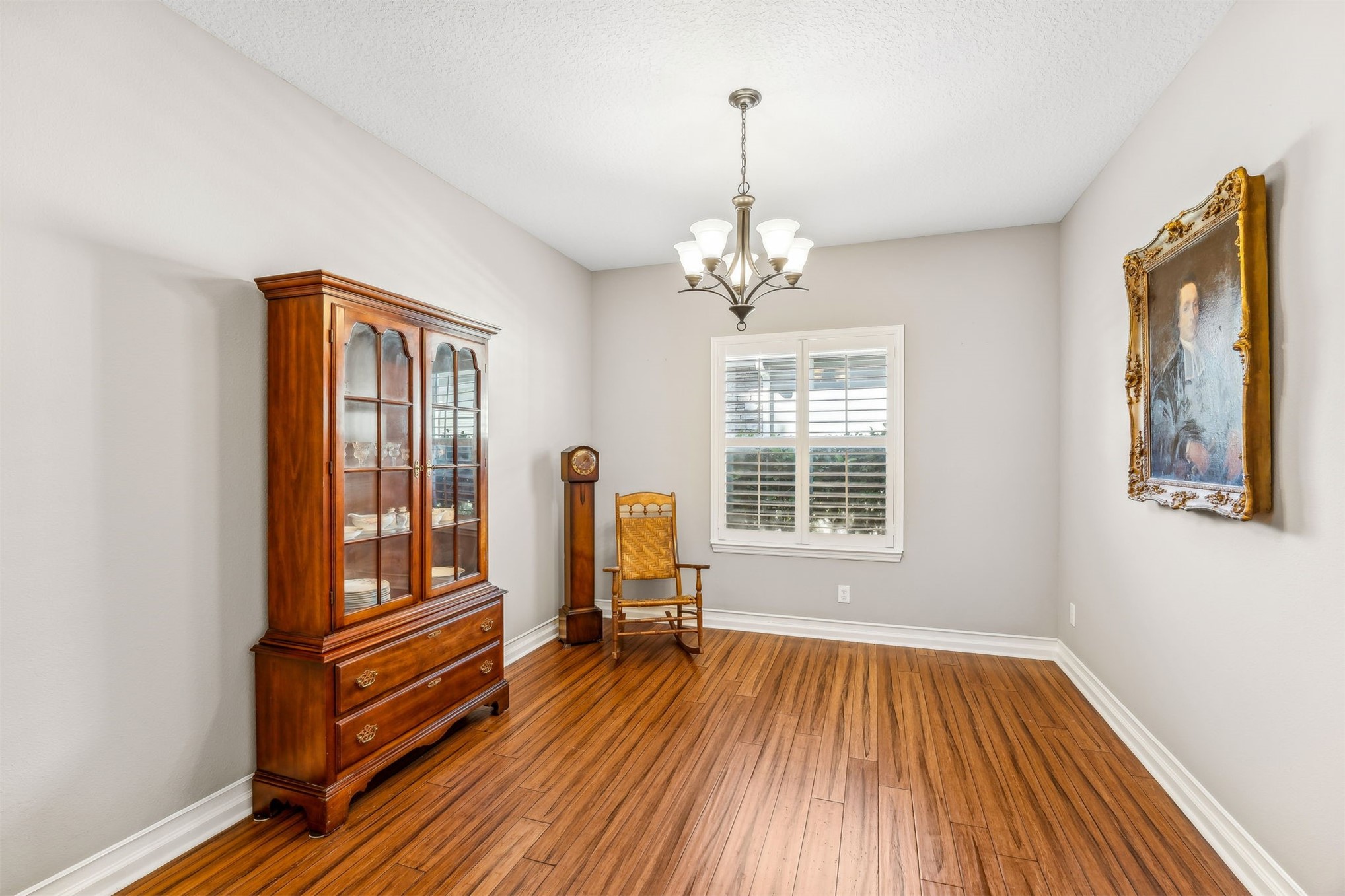95050 Poplar Way Fernandina Beach, FL 32034 - Photo 15 of 42 a view of a room with wooden floor windows and chandelier