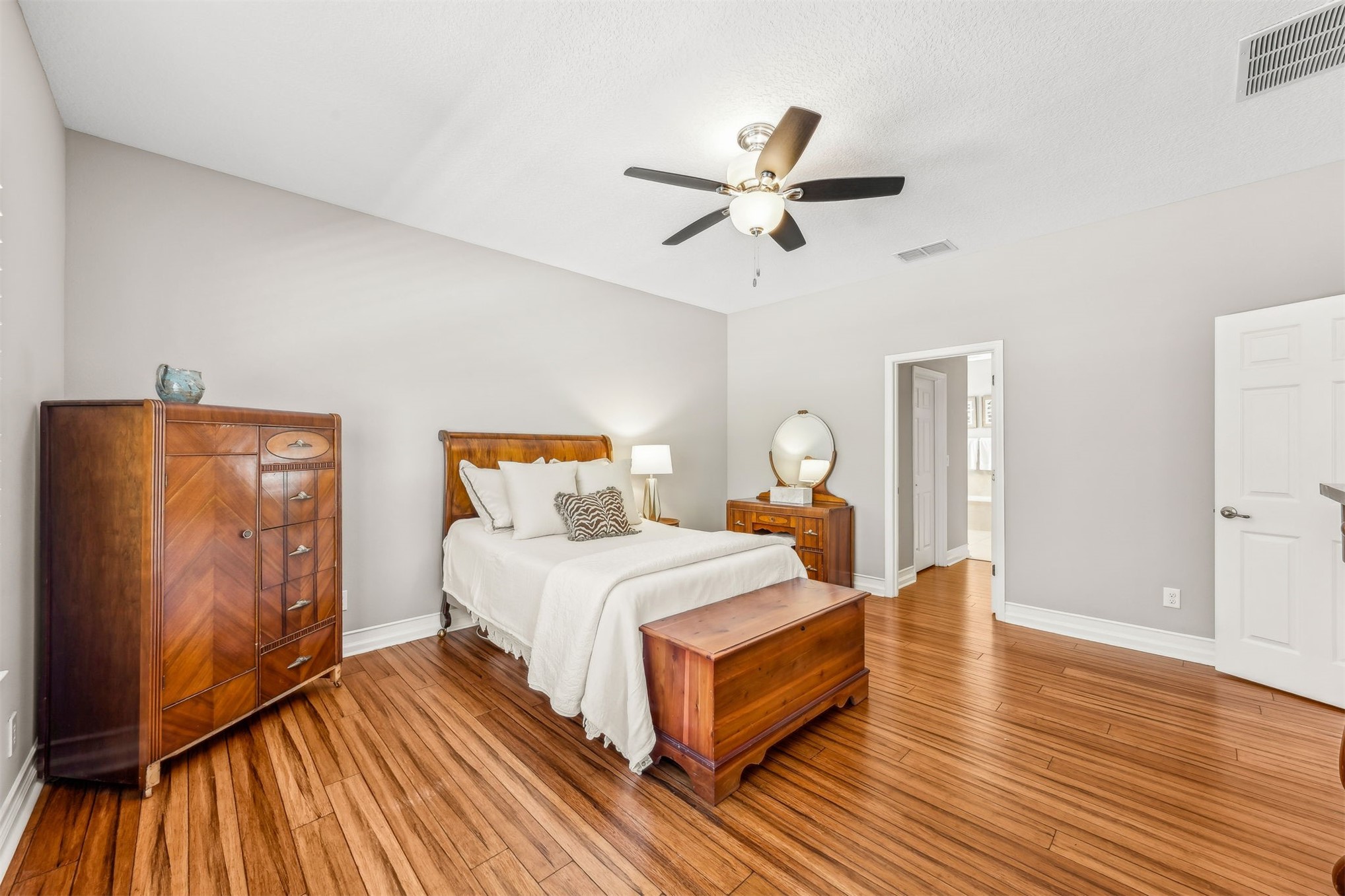 95050 Poplar Way Fernandina Beach, FL 32034 - Photo 18 of 42 a bedroom with a bed and wooden floor
