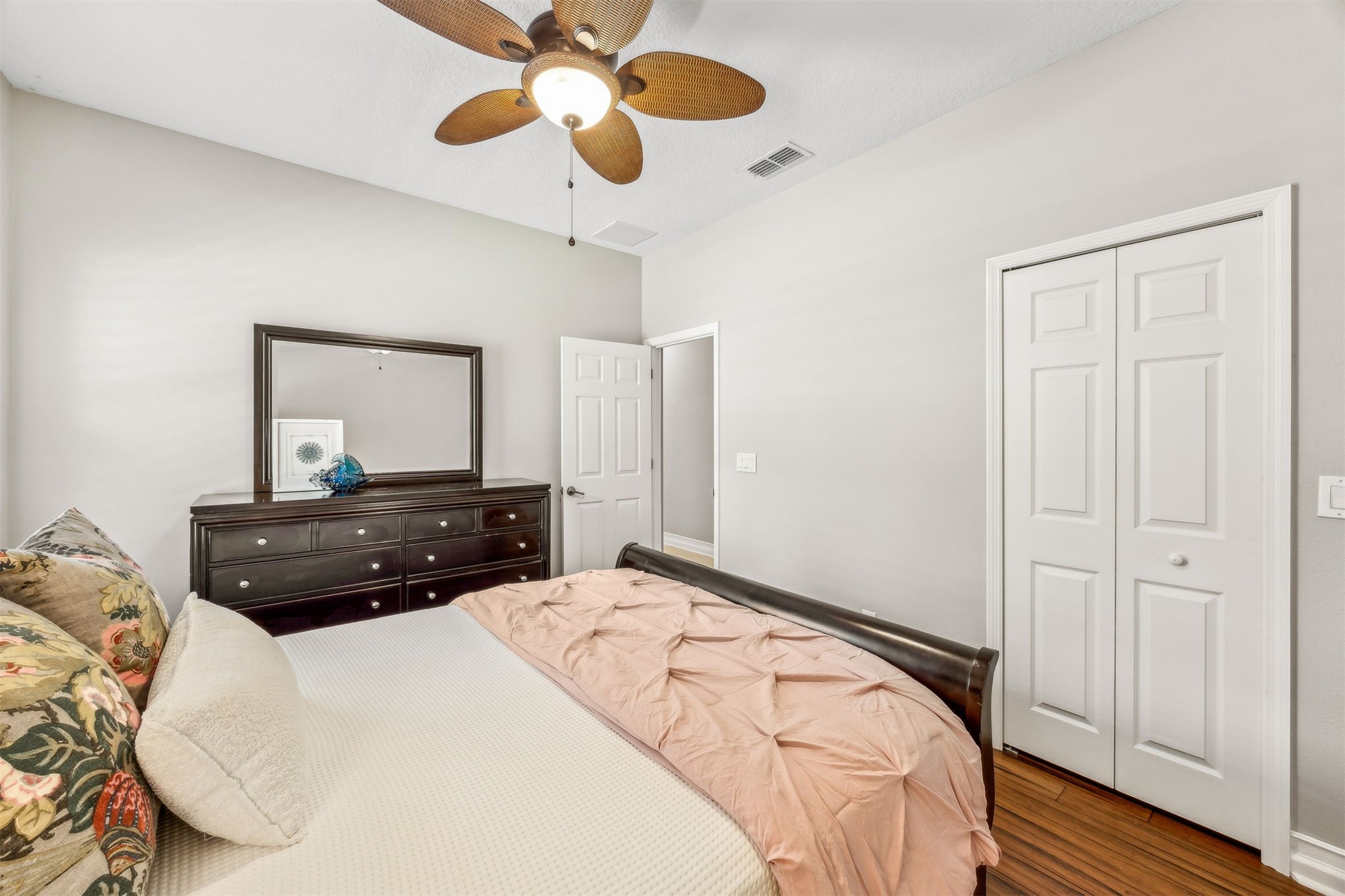 95050 Poplar Way Fernandina Beach, FL 32034 - Photo 23 of 42 a bedroom with a bed and a large mirror