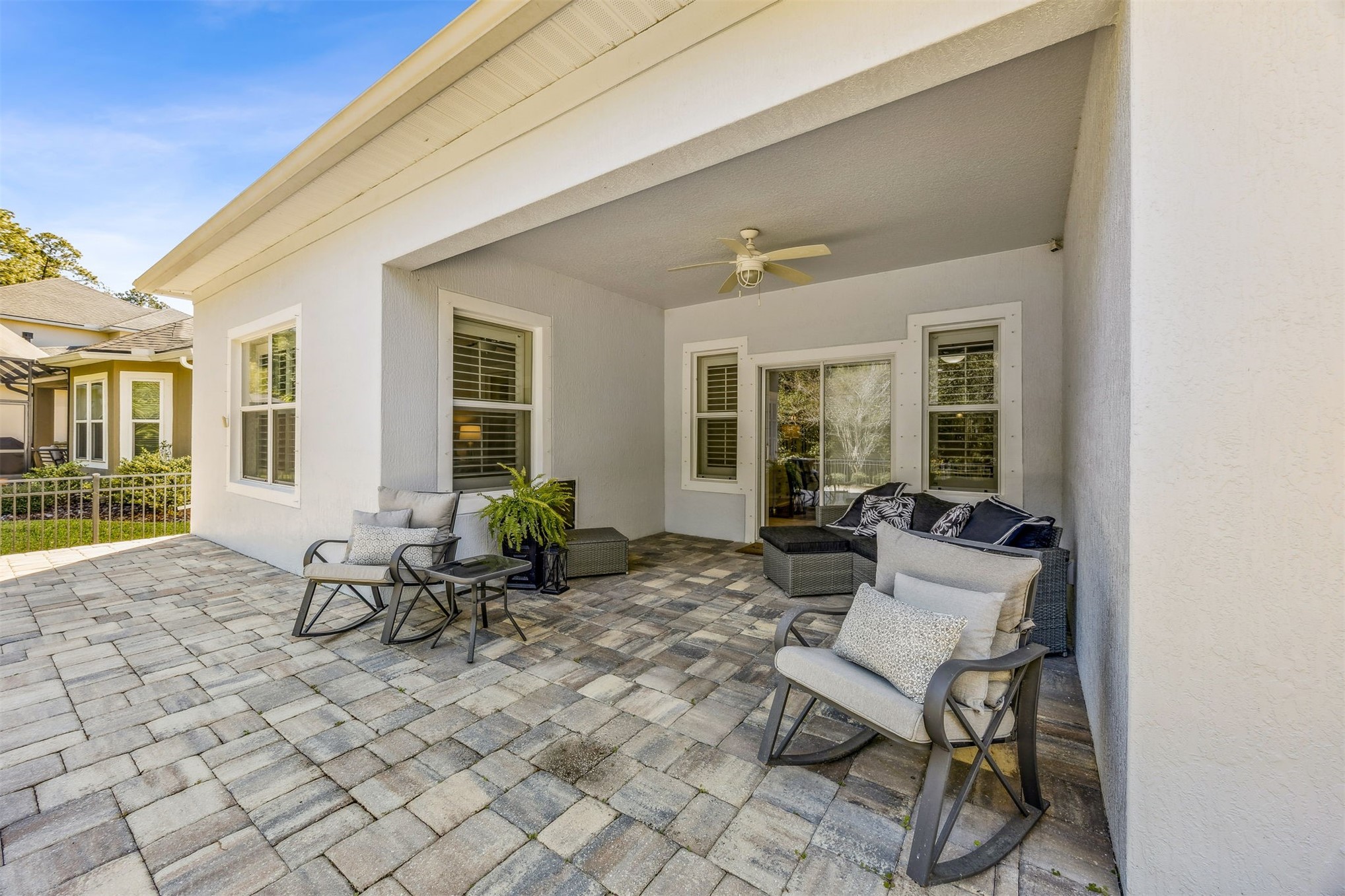 95050 Poplar Way Fernandina Beach, FL 32034 - Photo 28 of 42 a building outdoor space with patio furniture and potted plants