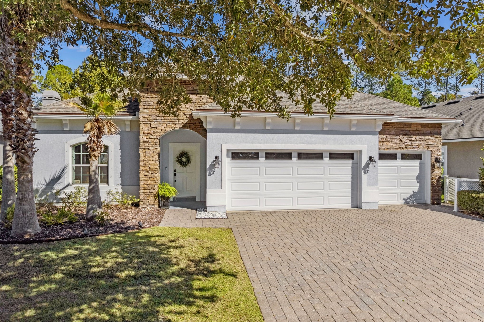 95050 Poplar Way Fernandina Beach, FL 32034 - Photo 30 of 42 front view of a house with a small yard