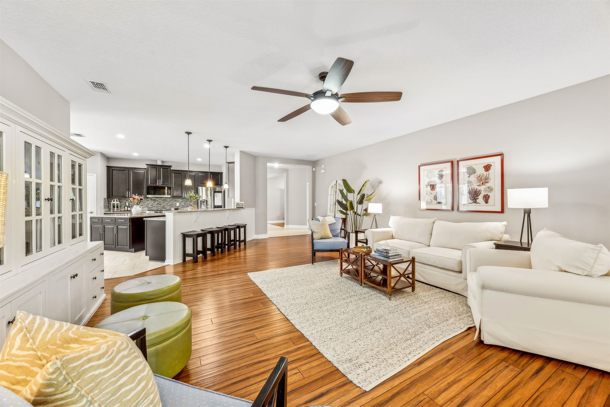 95050 Poplar Way Fernandina Beach, FL 32034 - Photo 5 of 42 a living room with furniture kitchen view and a wooden floor