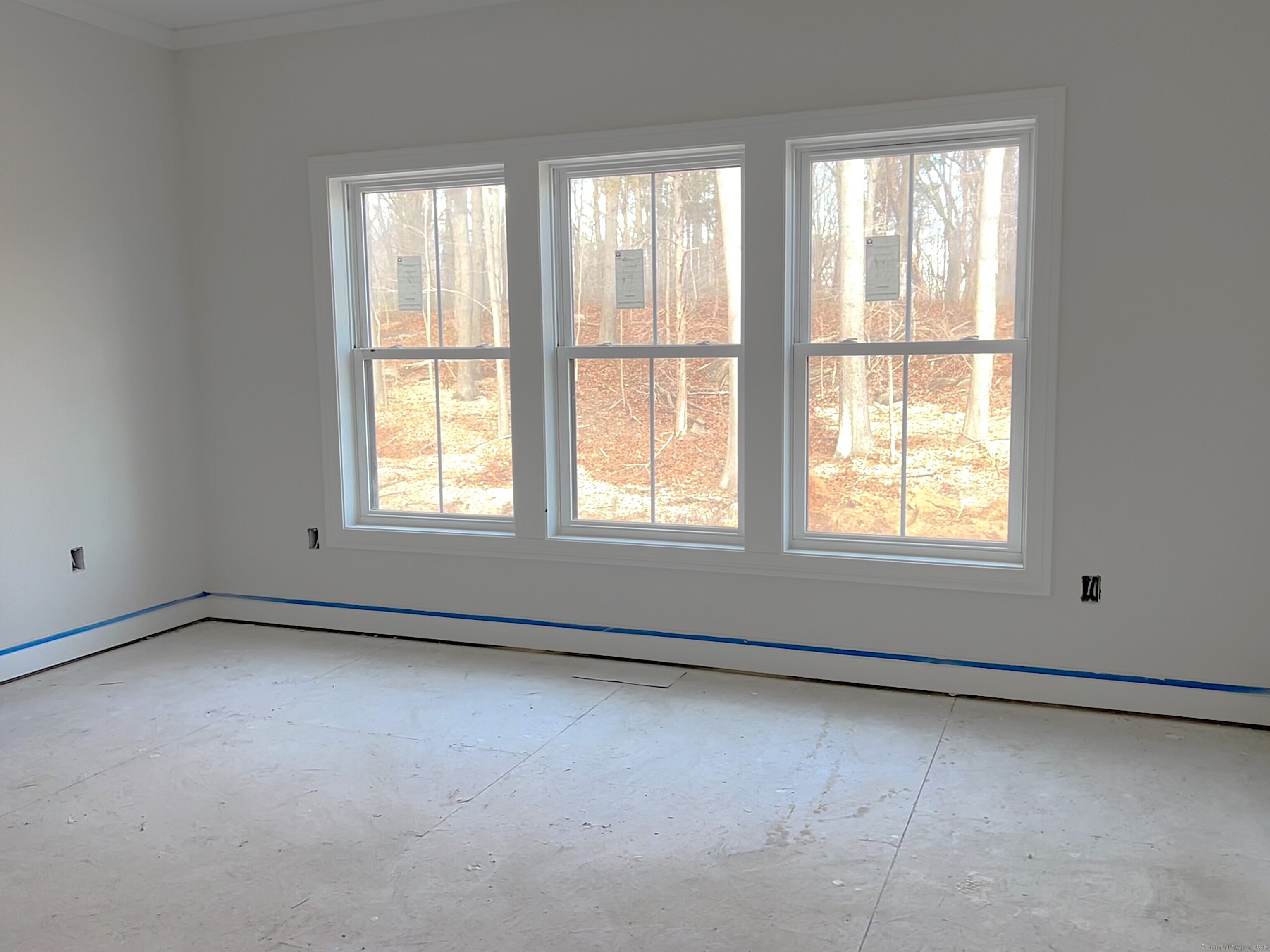 33 Village Circle, Unit 33 Guilford, CT 06437 - Photo 11 of 14 a view of an empty room with a window