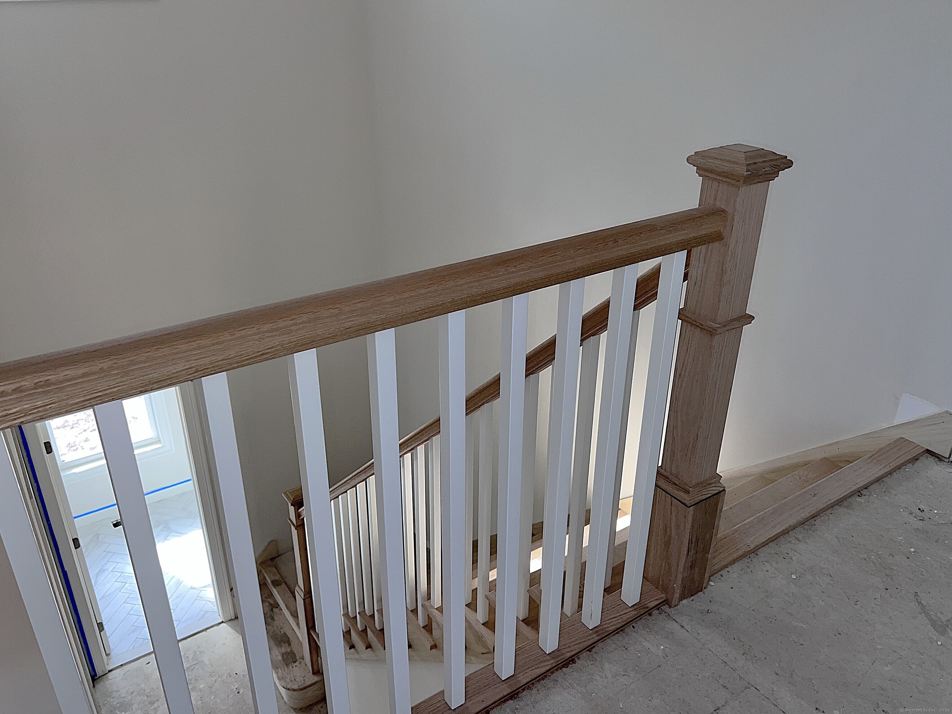 33 Village Circle, Unit 33 Guilford, CT 06437 - Photo 14 of 14 a view of staircase with railing and white walls