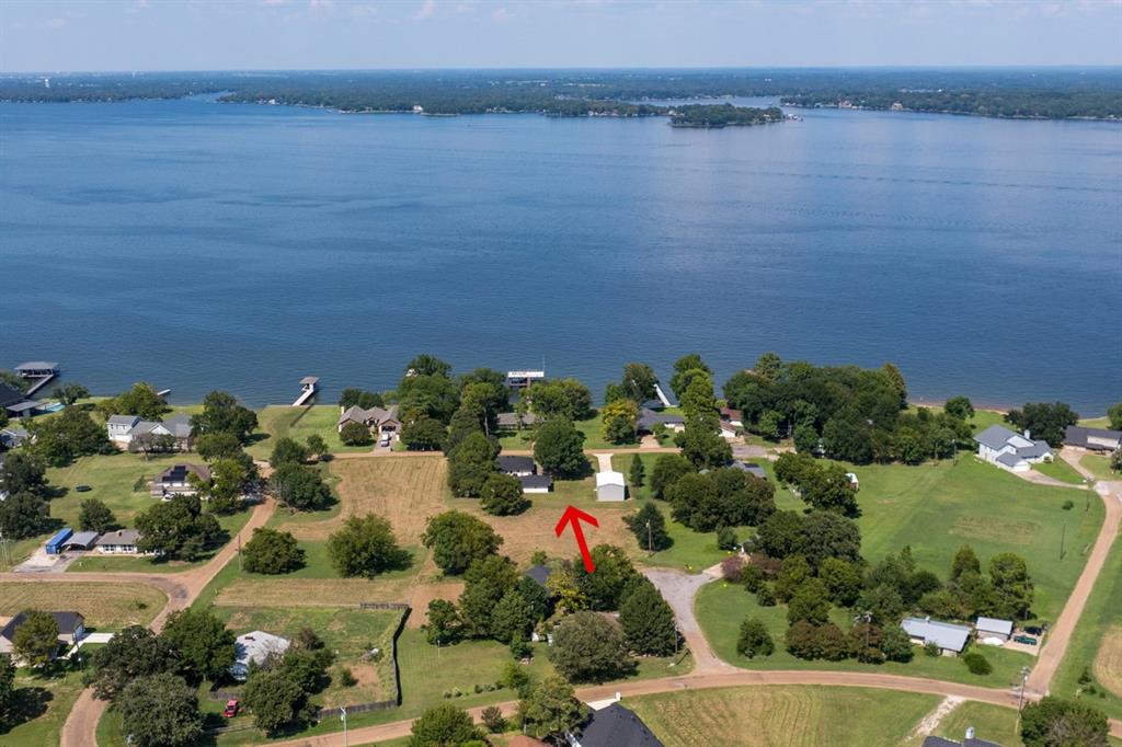 302 Santa Rosa Road, Unit R Trinidad, TX 75163 - Photo 5 of 23 an aerial view of a house with a lake view