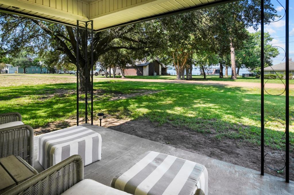 302 Santa Rosa Road, Unit R Trinidad, TX 75163 - Photo 8 of 23 a view of a two chairs in a park