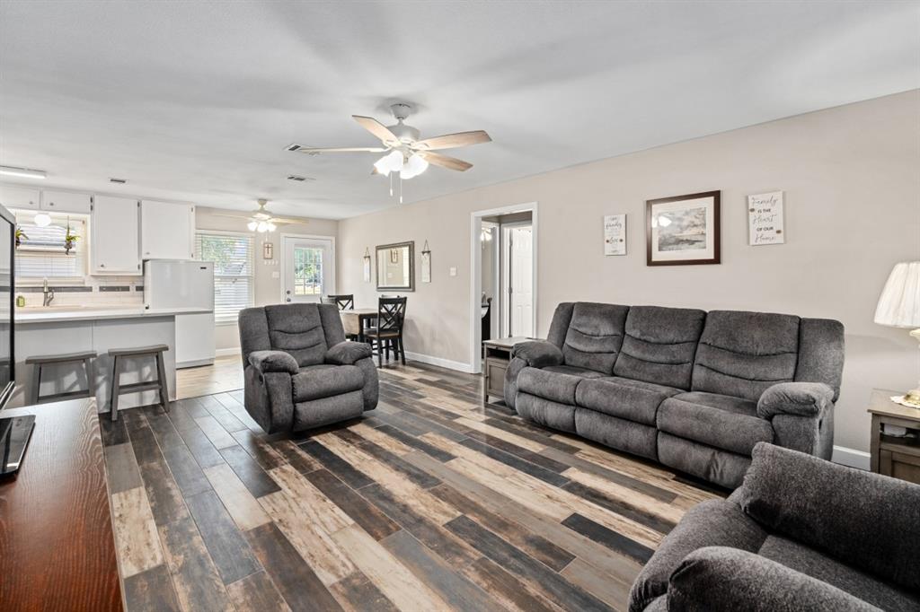302 Santa Rosa Road, Unit R Trinidad, TX 75163 - Photo 10 of 23 a living room with furniture and a wooden floor