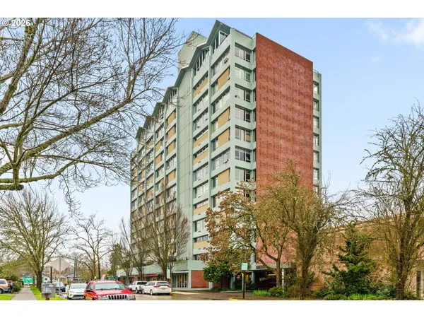 a view of a building and a street