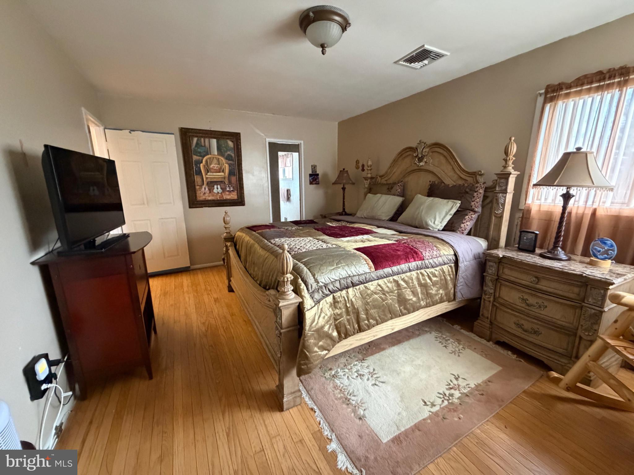 89 Upper Ferry Road Ewing, NJ 08628 - Photo 21 of 31 Cozy bedroom with warm, inviting tones.