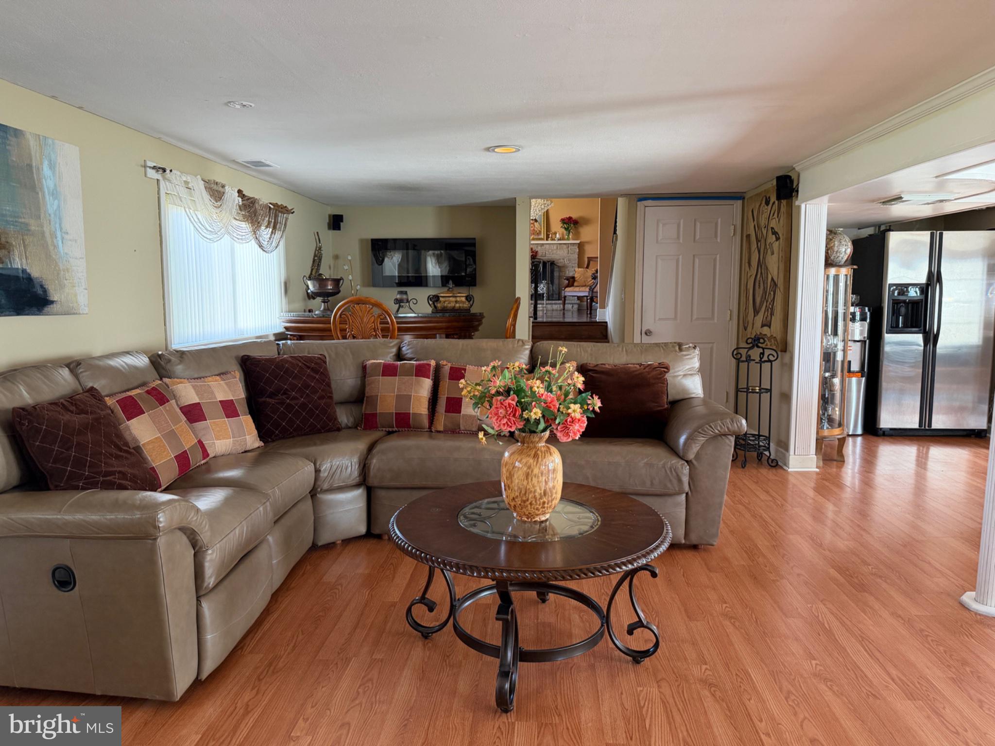 89 Upper Ferry Road Ewing, NJ 08628 - Photo 9 of 31 Spacious living area with warm tones.