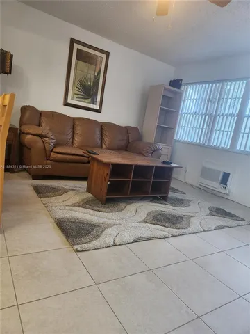 a living room with a couch and a coffee table