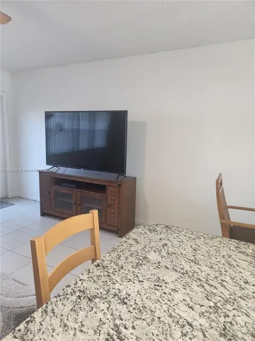 a bedroom with a bed and furniture