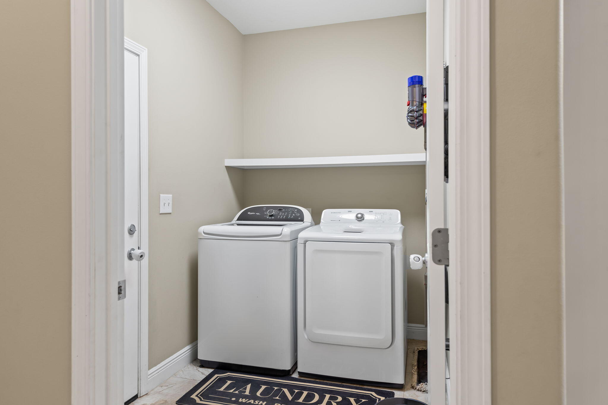 765 Ridge Lake Road Crestview, FL 32536 - Photo 20 of 46 a utility room with dryer and washer