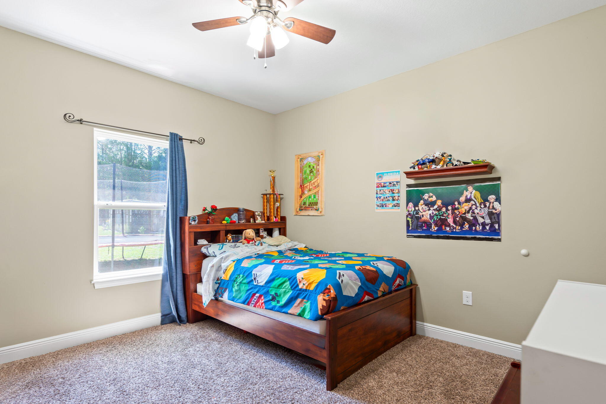 765 Ridge Lake Road Crestview, FL 32536 - Photo 30 of 46 a bedroom with a bed and a window