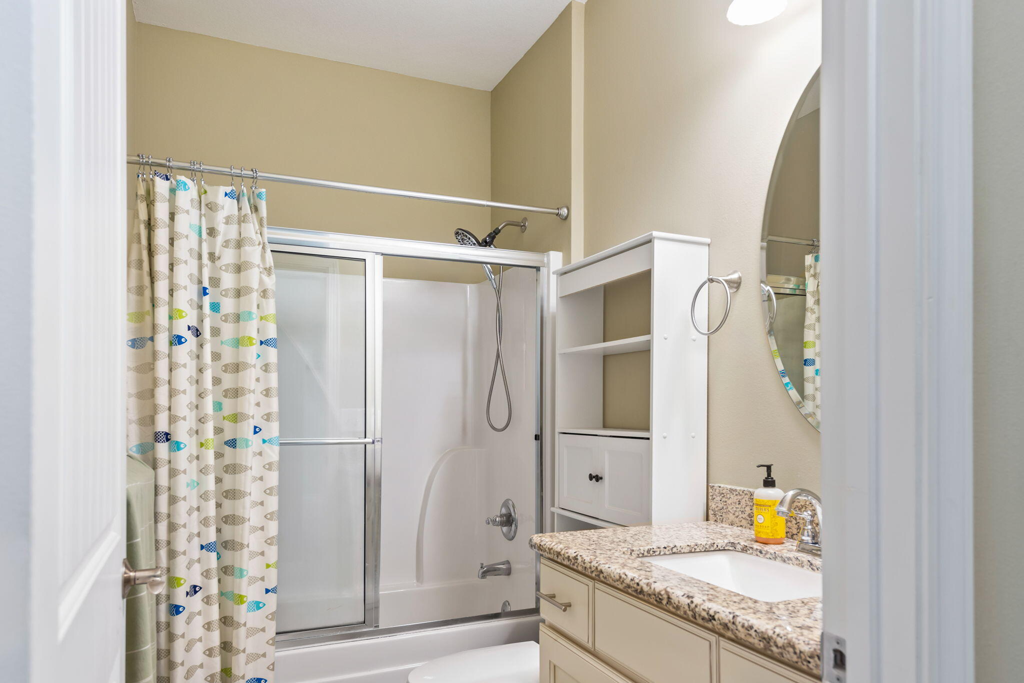 765 Ridge Lake Road Crestview, FL 32536 - Photo 34 of 46 a bathroom with a granite countertop shower and a sink
