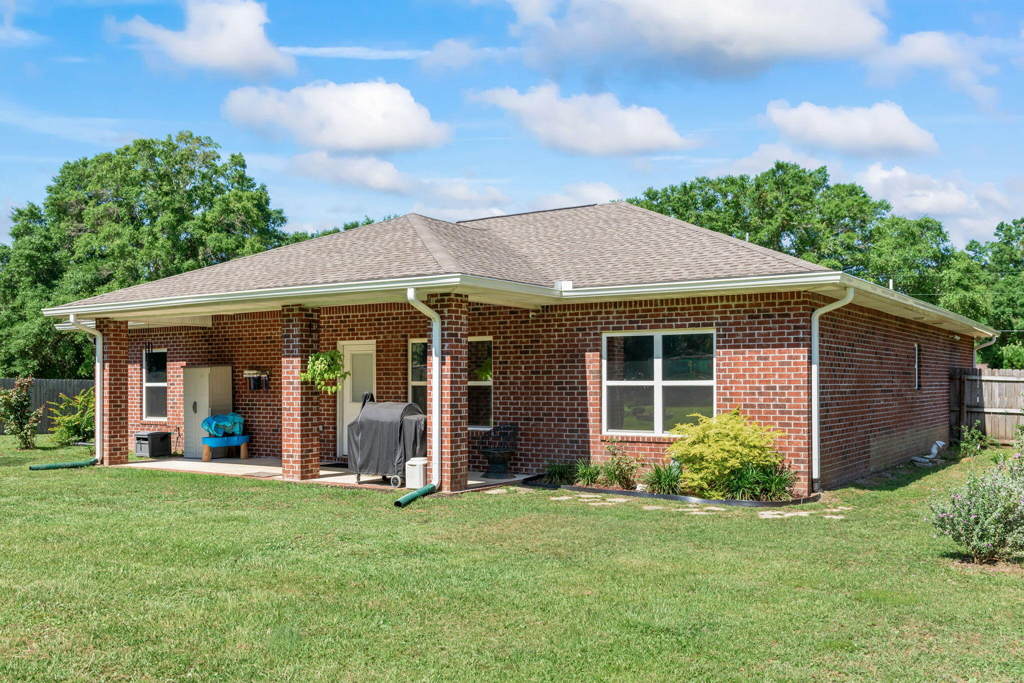 765 Ridge Lake Road Crestview, FL 32536 - Photo 36 of 46 front view of a house with a yard