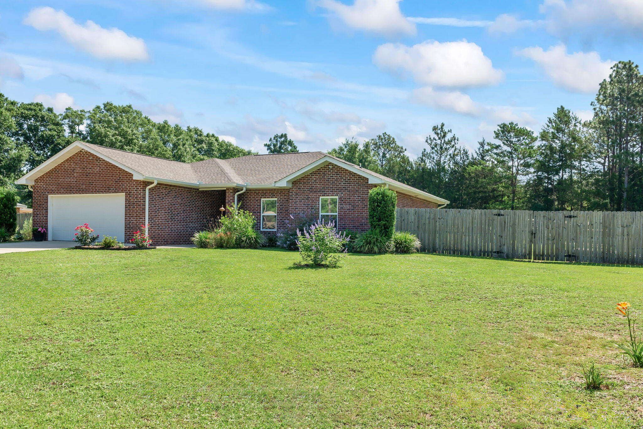 765 Ridge Lake Road Crestview, FL 32536 - Photo 4 of 46 a front view of house with yard and green space