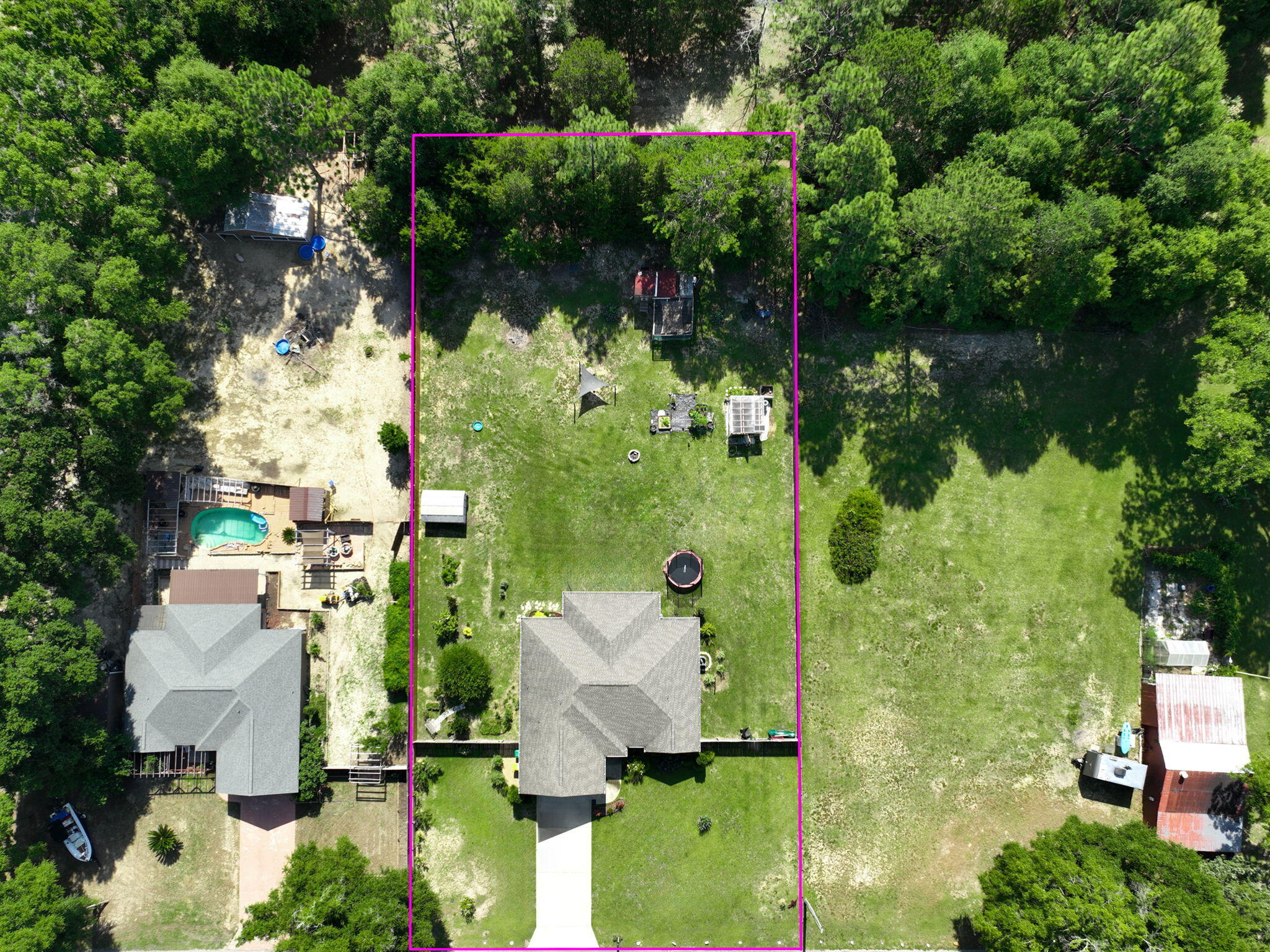 765 Ridge Lake Road Crestview, FL 32536 - Photo 43 of 46 an aerial view of a house with a yard and large trees