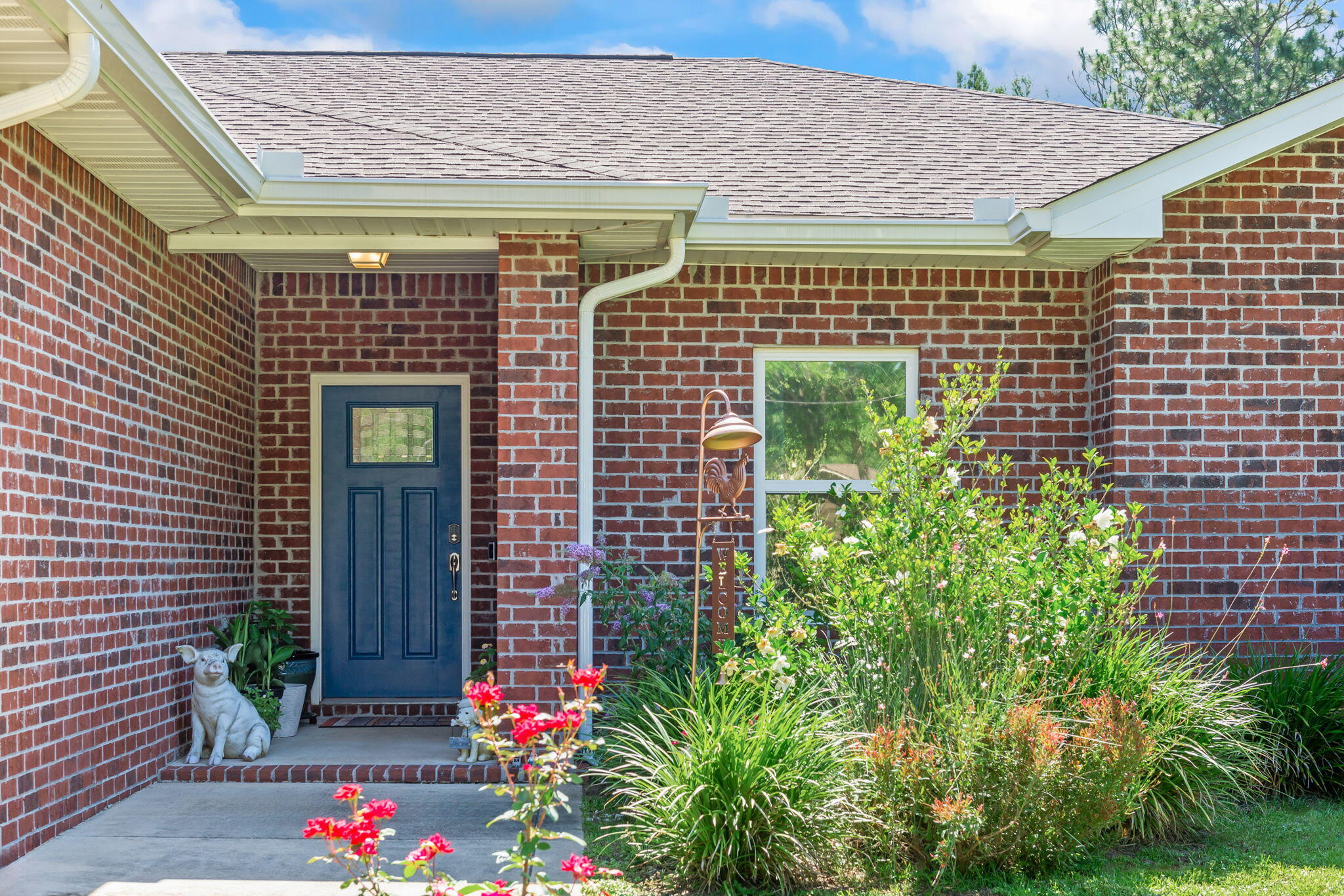 765 Ridge Lake Road Crestview, FL 32536 - Photo 6 of 46 a front view of a house with plants