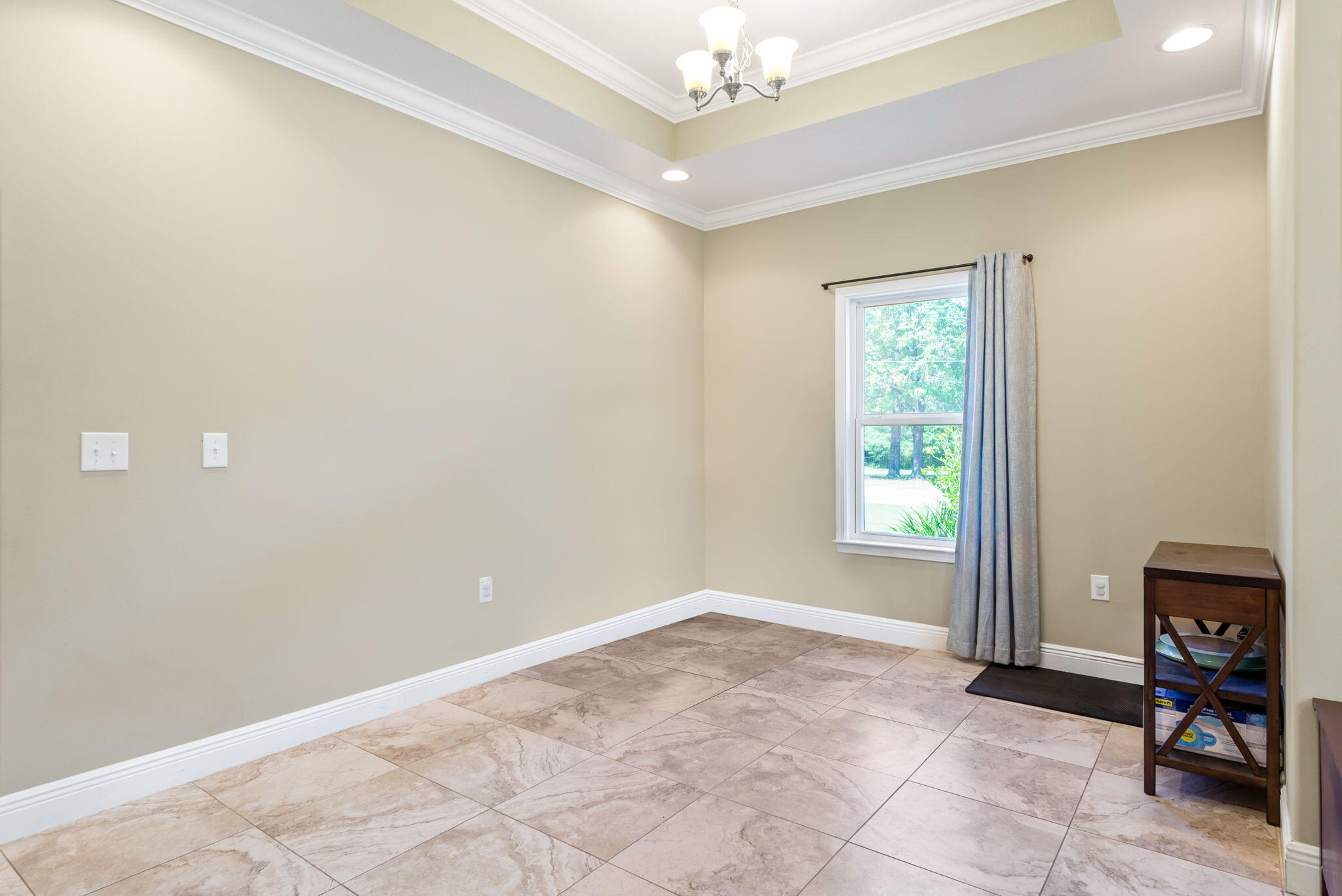 765 Ridge Lake Road Crestview, FL 32536 - Photo 10 of 46 a view of an empty room with a window