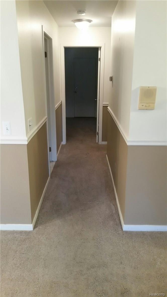 27991 Rollcrest Road, Unit 6 Farmington, MI 48334 - Photo 3 of 5 rollcresthalltobedrooms.jpg