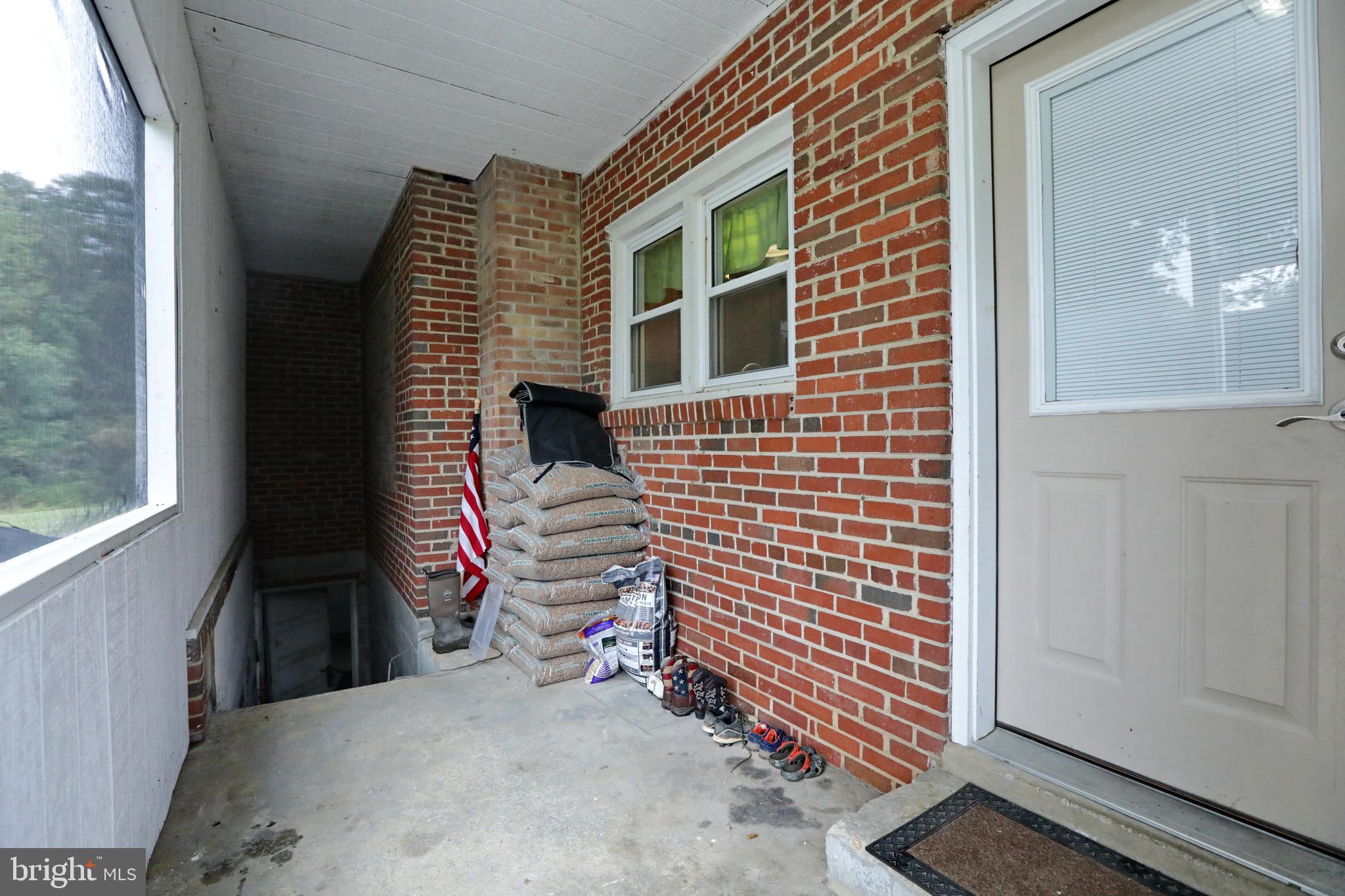 5630 Hilltop Road Welcome, MD 20693 - Photo 14 of 49 Backporch with access to celler