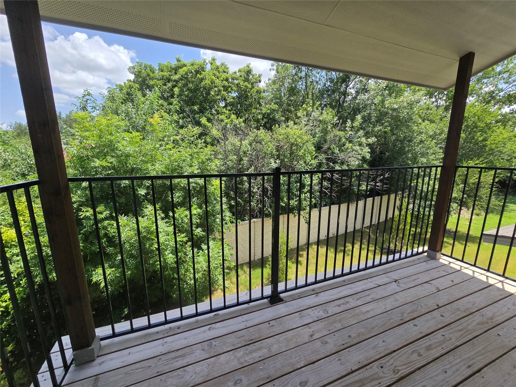 2105 Tiger Trail, Unit 702 Round Rock, TX 78664 - Photo 13 of 22 a view of balcony with wooden floor