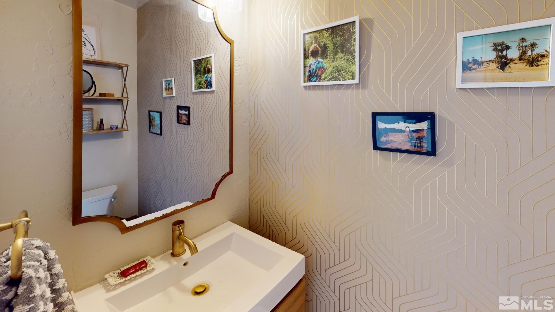 945 Cordone Avenue Reno, NV 89502 - Photo 21 of 33 a bathroom with a sink and a mirror