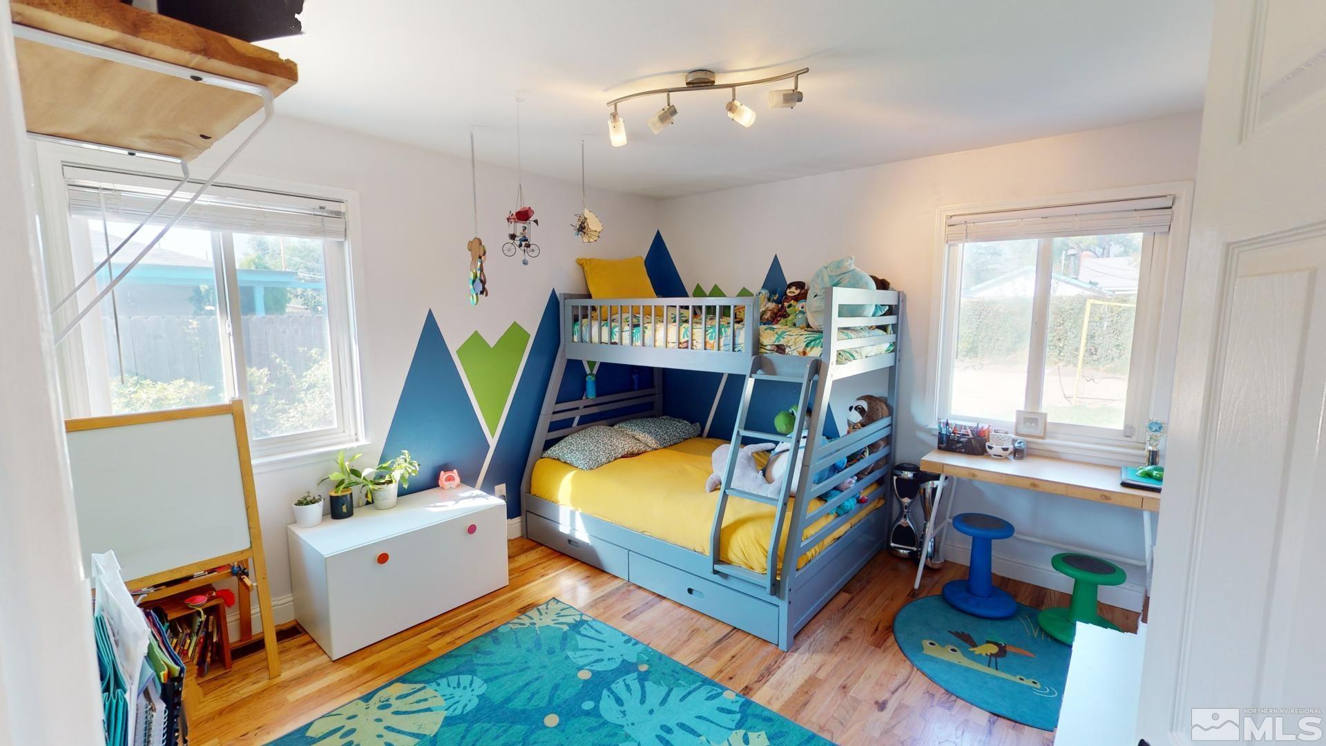 945 Cordone Avenue Reno, NV 89502 - Photo 23 of 33 a bed room with furniture and a window