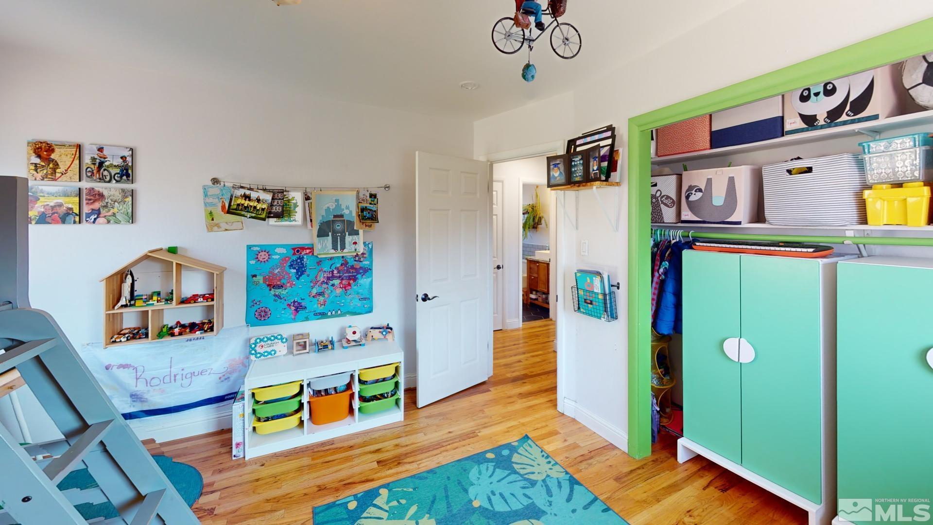 945 Cordone Avenue Reno, NV 89502 - Photo 24 of 33 a room with furniture and a baby crib