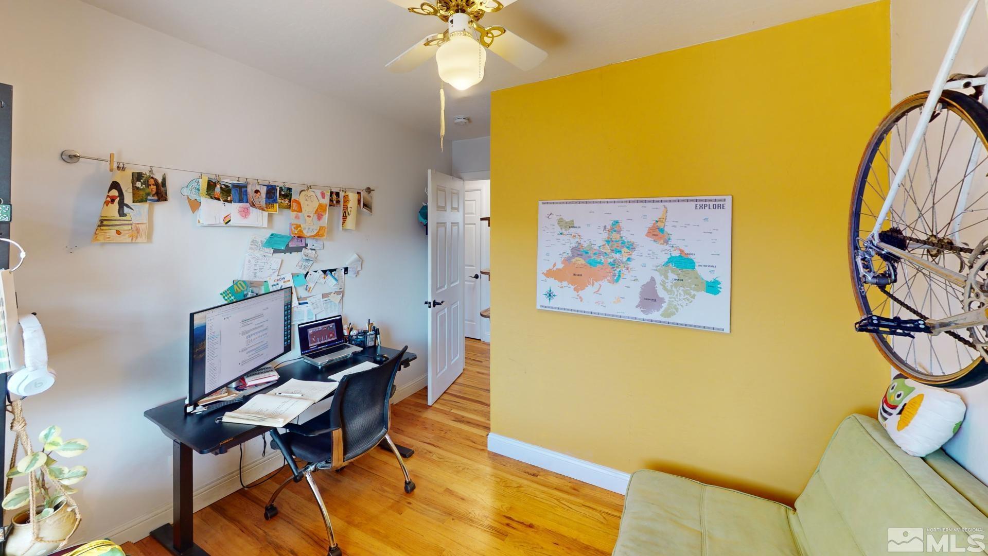 945 Cordone Avenue Reno, NV 89502 - Photo 29 of 33 a workspace with furniture and a wall painting