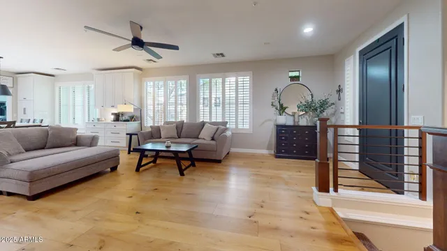 an aerial view of a house with a yard and garden
