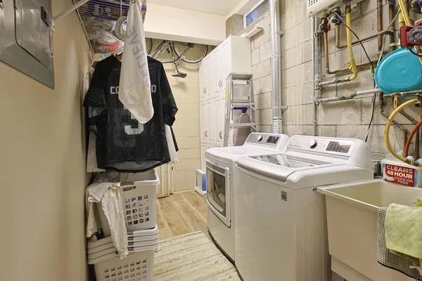 a utility room with dryer and washer