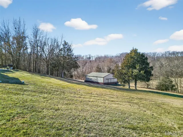 $875,000 | 113 Bridlespur Court, Hawk Point, MO 63349