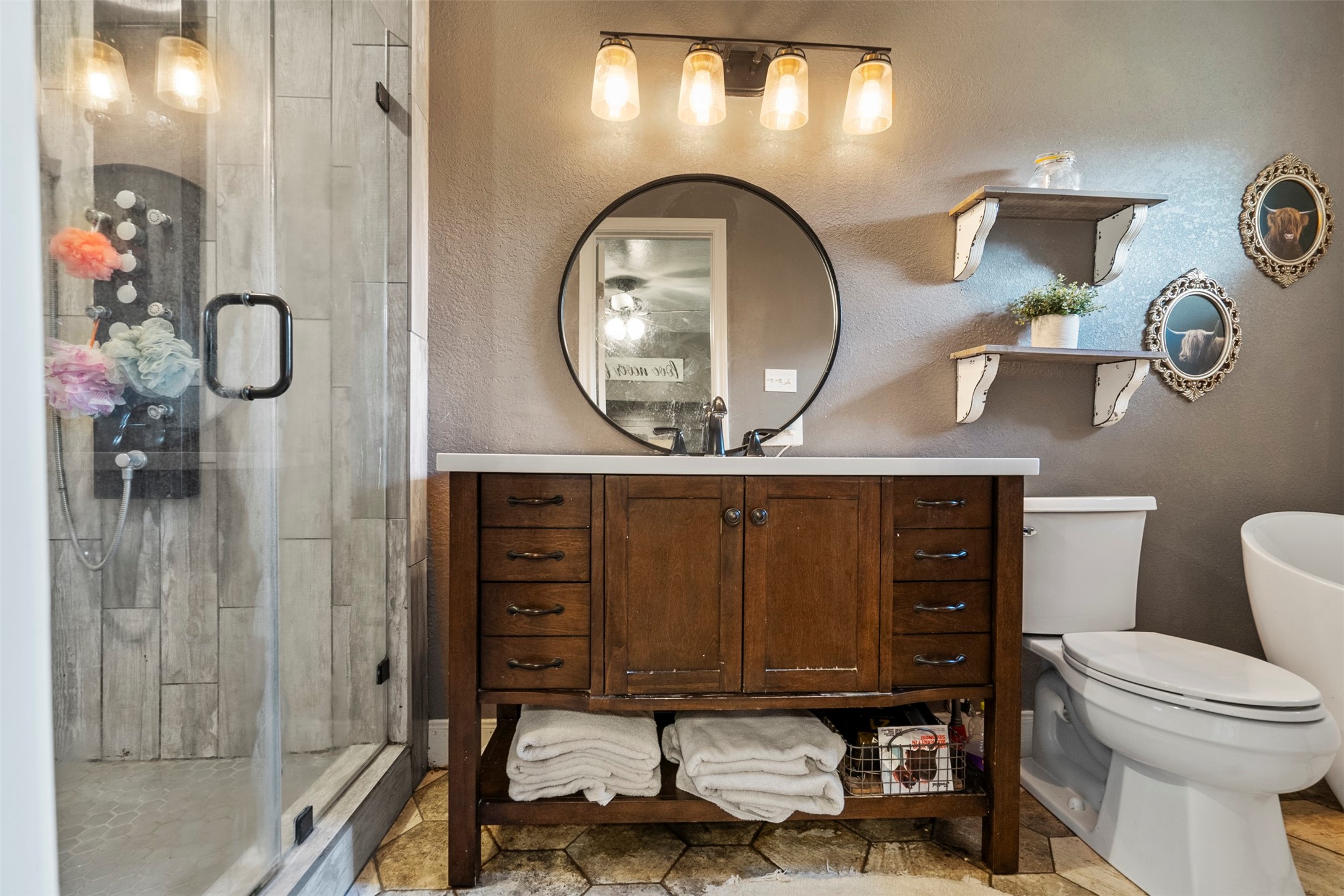 5211 Ghinaudo Road Hitchcock, TX 77563 - Photo 24 of 34 a living room with furniture and a mirror