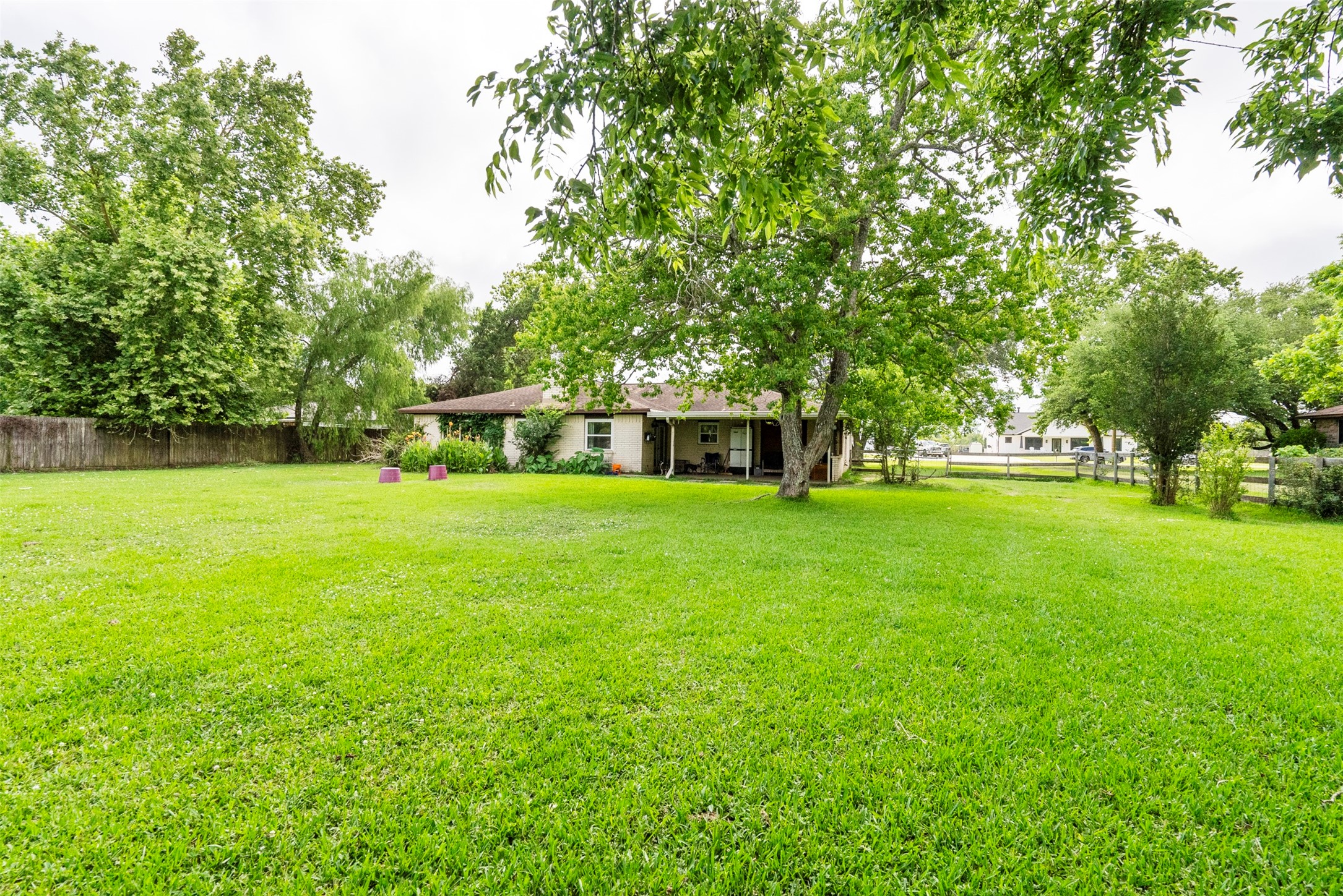 5211 Ghinaudo Road Hitchcock, TX 77563 - Photo 28 of 34 a front view of a house with yard and green space