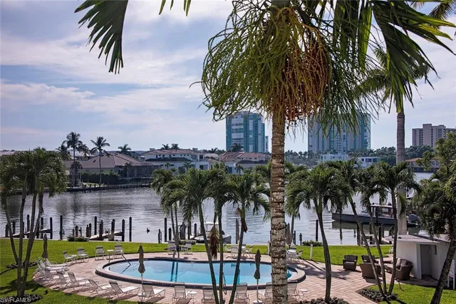a view of outdoor space with palm trees