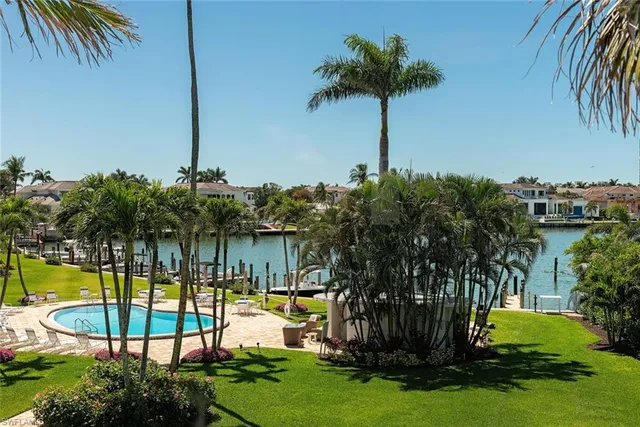 a view of a swimming pool with a garden