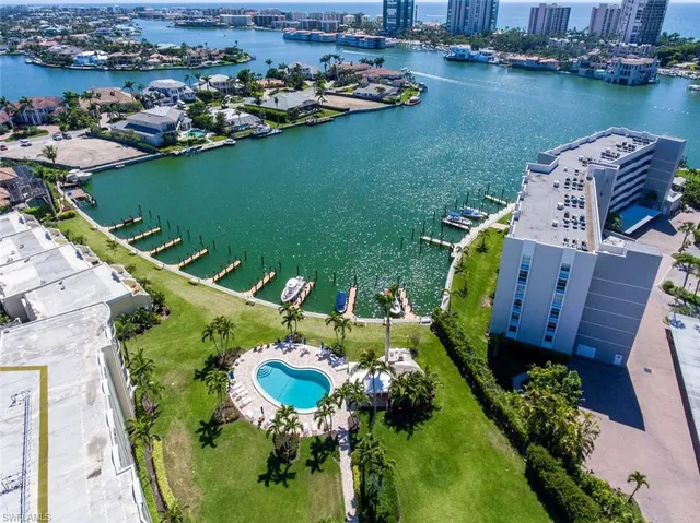an aerial view of a house with a lake view