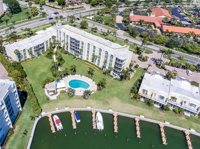 an aerial view of a swimming pool patio and mountain view