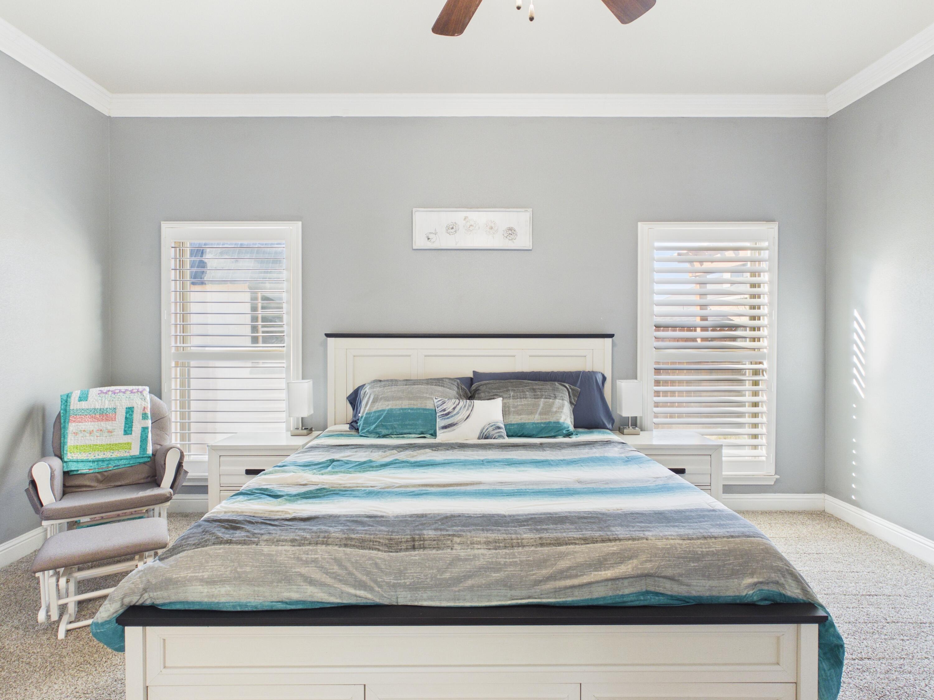 7101 94th Street Lubbock, TX 79424 - Photo 23 of 33 a bedroom with a bed and a window