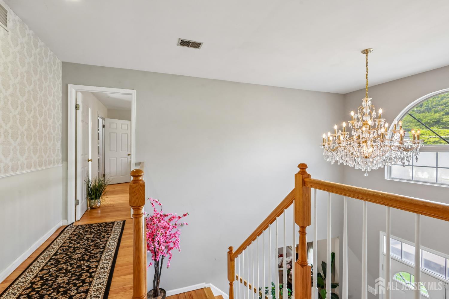 489 Plainfield Road Edison, NJ 08820 - Photo 28 of 39 a view of entryway with a front door and wooden floor