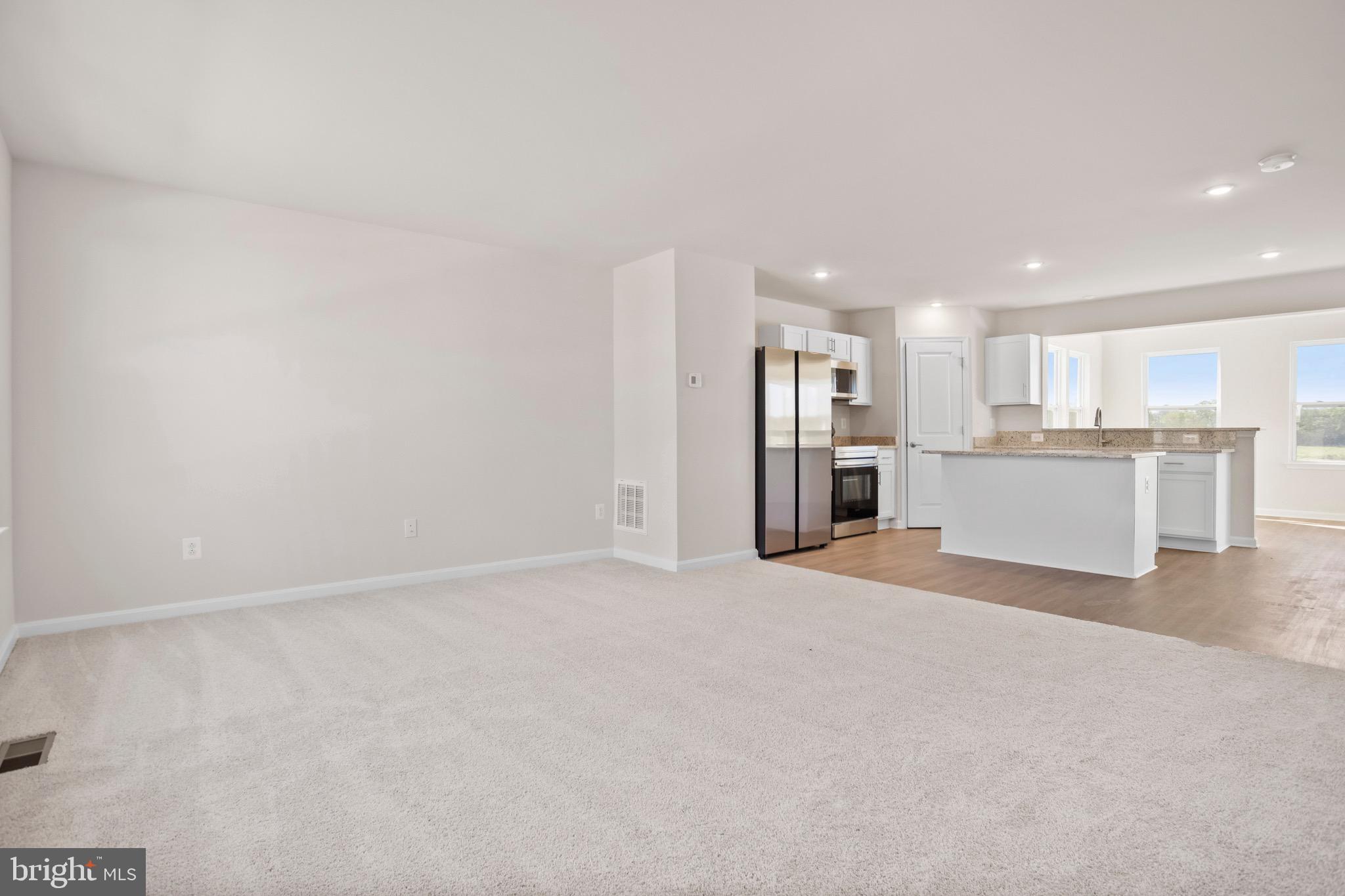 0 Grayling Road Inwood, WV 25428 - Photo 7 of 24 a view of a kitchen with a sink and a refrigerator