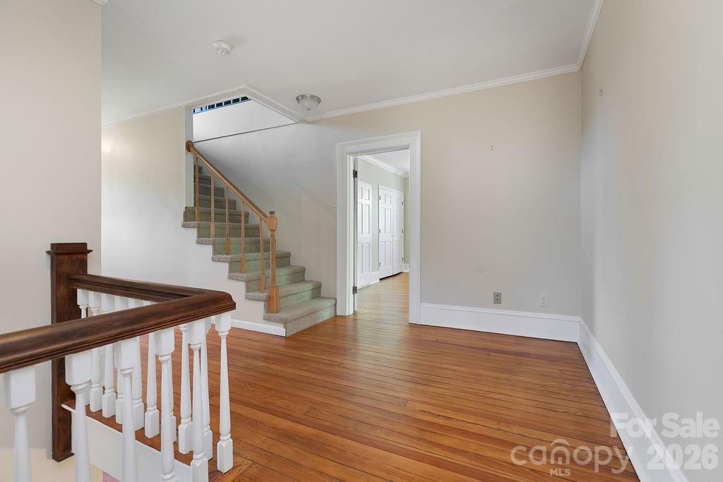 208 West Probart Street Brevard, NC 28712 - Photo 31 of 48 a view of an entryway with wooden floor