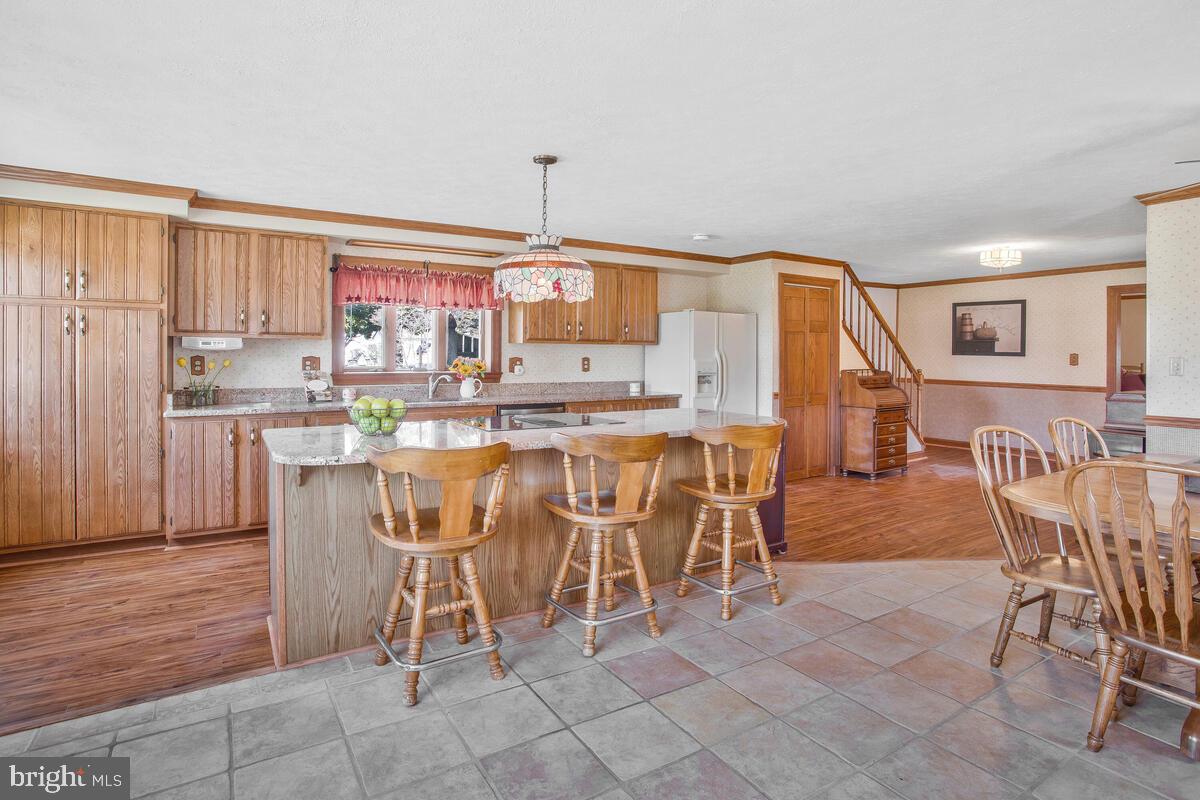 341 St Georges Road Essex, MD 21221 - Photo 4 of 36 kitchen-large island with granite counters