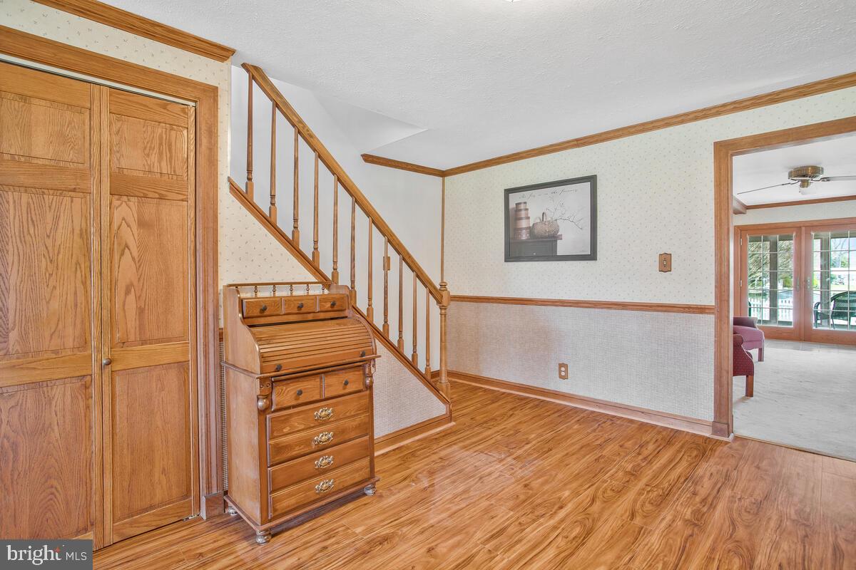 341 St Georges Road Essex, MD 21221 - Photo 10 of 36 coat closet and entrance to upper level